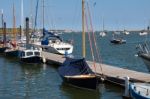 Boats Moored At A Jetty In Wells Stock Photo