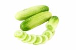 Cucumber Whole And Curve Of Sliced On White Background Stock Photo