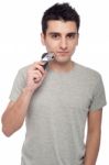 Young Man Shaving Stock Photo