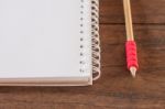 Work Station With Notebook And Pencil Stock Photo