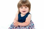 Adorable Baby Girl Sitting Stock Photo