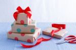 Presents With Wrapped Boxes On Table Stock Photo