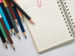 Top View Notebook With Pencil On White Background Stock Photo