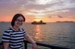 Women Tourist Cruising At Sunset Stock Photo