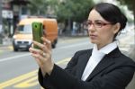 Business Woman Taking A Picture With Mobile Phone Stock Photo