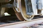 Beautiful Close-up Of The Old Train Wheels And The Road Stock Photo