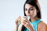 Beautiful Woman Drinking Coffee Stock Photo