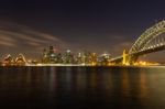 Opera House And Harbour Bridge In Sydney At Night, It Is Illumin Stock Photo