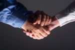 Close Up Of Two Male Hands Shaking Stock Photo