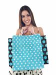 Smiling Girl Holding Shopping Bags Stock Photo