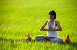 Girl Practicing Yoga Stock Photo