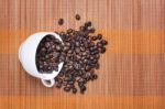 Coffee Bean Cup Spill Over Stock Photo