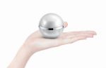 Silver Sphere Cosmetic Jar On Hand Isolated Stock Photo