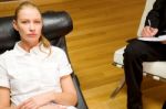 Psychiatrist Examining A Female Patient Stock Photo