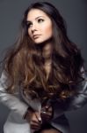 Portrait Of Pretty Young Woman Posing In The Studio Photo Stock Photo