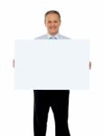 Old Businessman Holding Blank Board Stock Photo