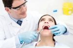 Teeth Whitening At Dental Office Stock Photo