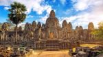 Ancient Stone Faces At Sunset Of Bayon Temple, Angkor Wat, Siam Reap, Cambodia Stock Photo