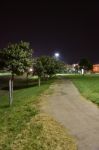 Night Public Park In The City With Houses Near Stock Photo