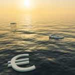 Euro Floating In Sea At Sunset Stock Photo