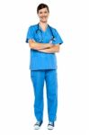 Smart Looking Female Doctor, Arms Folded Stock Photo