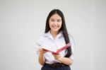 Asia Thai High School Student Uniform Beautiful Girl Read A Book Stock Photo