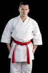 Ontrast Karate Young Fighter On Black Stock Photo