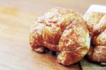 Croissants On Wooden Stock Photo