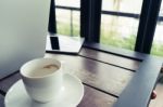 Coffee And Blur Laptop On Table In Retro Style Stock Photo