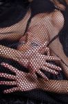 Woman Traped In Black Fishnet Stock Photo