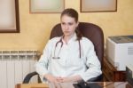 Female Medical Doctor In A Hospital Office Stock Photo