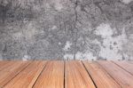 Top Of Wood Table On Old Concrete Wall Background Stock Photo