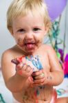 Baby Girl Celebrating Her First Bithday With Gourmet Cake And Ba Stock Photo