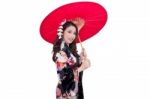 Beautiful Young Asian Woman Wearing Traditional Japanese Kimono With Red Umbrella Isolated On White Background Stock Photo