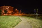 Night Public Park In The City With Houses Near Stock Photo