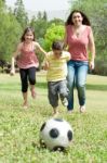 Mom Playing With Children Stock Photo