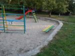 Children Playground, Swing Near The House  Stock Photo