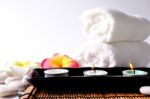 Three Candles In Ceramic Bowl Stock Photo