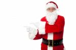 Santa Pointing At Blank Copy Space Area Stock Photo