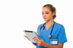 Female Doctor Using Tablet Pc Stock Photo