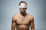 Portrait Of Young Naked Blindfold Man Stock Photo