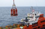 Transfer Crews By Personal Basket From The Platform To Crews Boat Stock Photo