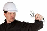 Handyman Wearing Uniform And Hardhat Stock Photo