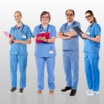 Senior Team Of Doctors Posing With A Smile Stock Photo