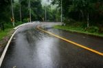 Wet Road Stock Photo