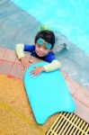 Boy With Swimming Accessories Stock Photo