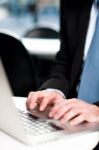 Businessman Working On Laptop Stock Photo