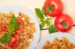 Italian Pasta Farfalle Butterfly Bow-tie And Tomato Sauce Stock Photo