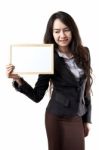 Businesswoman Holding White Board Stock Photo