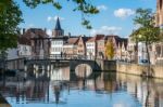 View Along A Canal In Bruges West Flanders In Belgium Stock Photo